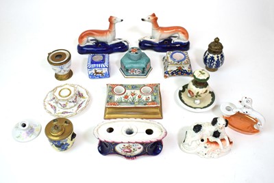 Lot 148 - A group of ceramic inkwells including a pair...