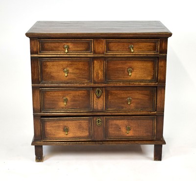 Lot 48 - A 17th century and later oak chest of four...