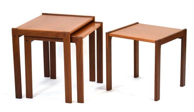 Lot 210 - A nest of three Danish teak occasional tables...