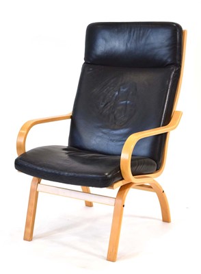 Lot 158 - A Danish beech framed armchair with black...