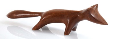 Lot 256 - John Fox, a teak sculpture modelled as a...