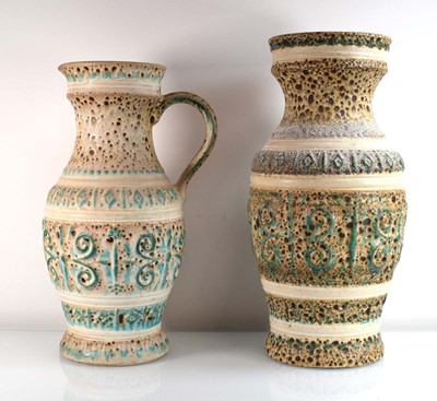 Lot 266 - A West German pottery vase, h. 49 cm, together...