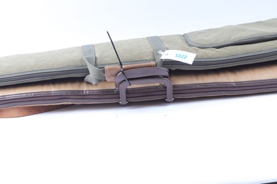 Lot 1322 - 2x padded gun slips, including 1x green canvas...