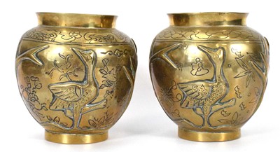 Lot 111 - A pair of Japanese brass vases relief...