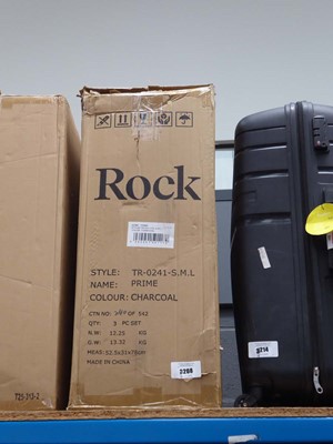 Lot 3231 - Three piece The Rock suitcase set in box
