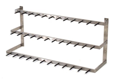 Lot 304 - A contemporary aluminium three-tier boot rack