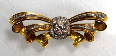 Lot 671 - An 18ct yellow gold brooch of bow design...