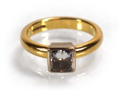 Lot 677 - A 9ct yellow gold ring set princess cut...