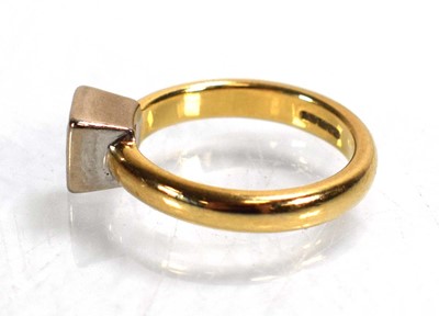 Lot 677 - A 9ct yellow gold ring set princess cut...