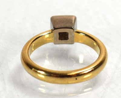 Lot 677 - A 9ct yellow gold ring set princess cut...