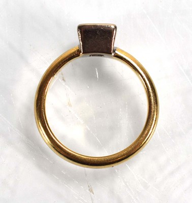 Lot 677 - A 9ct yellow gold ring set princess cut...