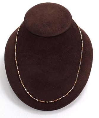 Lot 680 - A 14ct two colour gold bead type necklace, l....