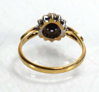 Lot 687 - A 9ct yellow gold sapphire and diamond cluster...