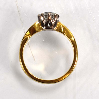 Lot 691 - An 18ct yellow gold ring set brilliant cut...