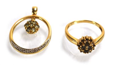 Lot 696 - A 14ct yellow gold cluster ring set small...