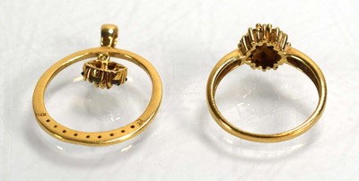 Lot 696 - A 14ct yellow gold cluster ring set small...
