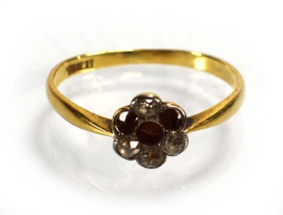 Lot 703 - An 18ct yellow gold cluster ring set small...