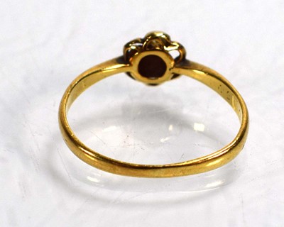 Lot 703 - An 18ct yellow gold cluster ring set small...