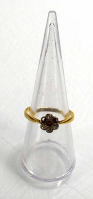 Lot 703 - An 18ct yellow gold cluster ring set small...