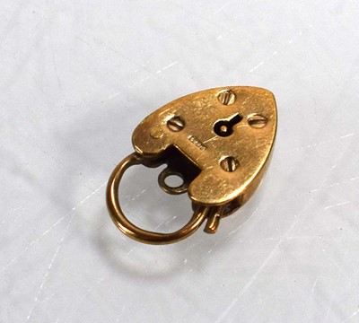 Lot 705 - A 9ct yellow gold clasp of heart shaped form,...