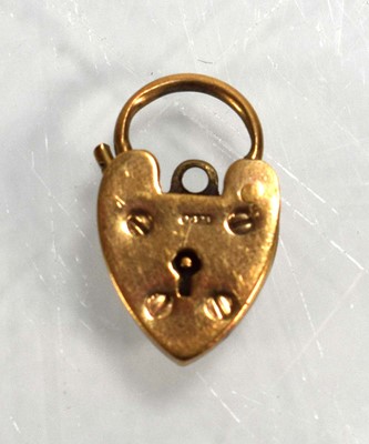 Lot 705 - A 9ct yellow gold clasp of heart shaped form,...