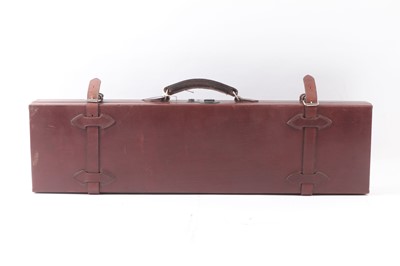 Lot 1425 - Maroon leather gun case, baize lined interior...