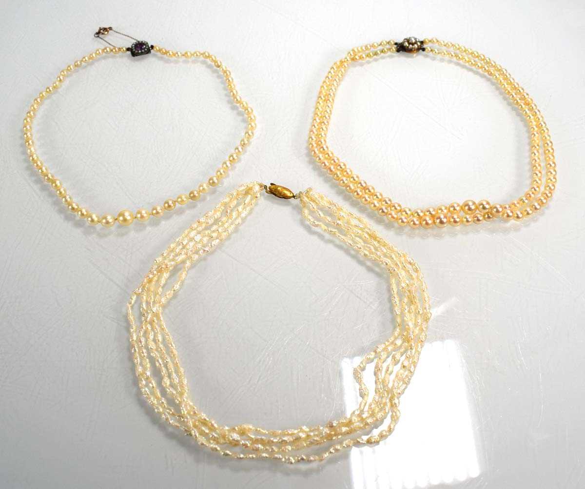 Lot 713 - A double strand graduated cultured pearl...