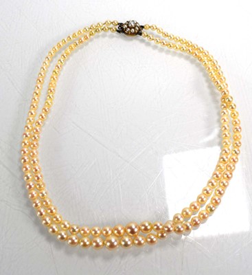 Lot 713 - A double strand graduated cultured pearl...