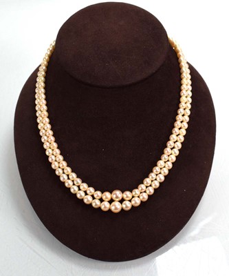 Lot 713 - A double strand graduated cultured pearl...