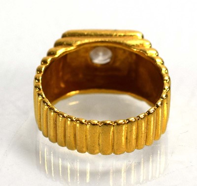Lot 714 - A 22ct yellow gold signet ring set clear stone...