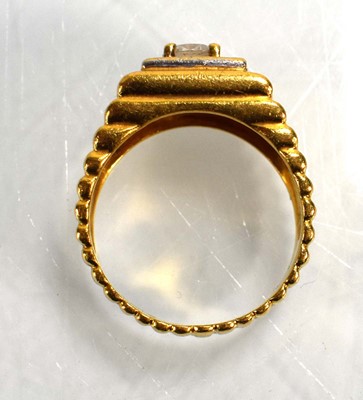 Lot 714 - A 22ct yellow gold signet ring set clear stone...