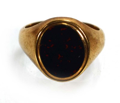 Lot 718 - A 9ct yellow gold signet ring set bloodstone,...