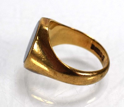 Lot 718 - A 9ct yellow gold signet ring set bloodstone,...