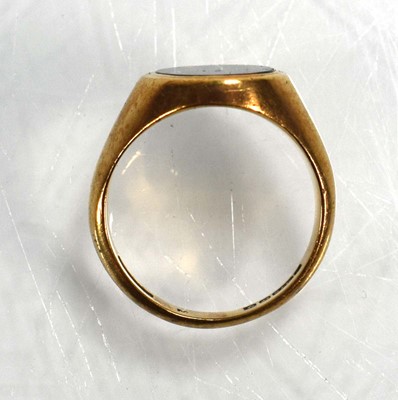 Lot 718 - A 9ct yellow gold signet ring set bloodstone,...