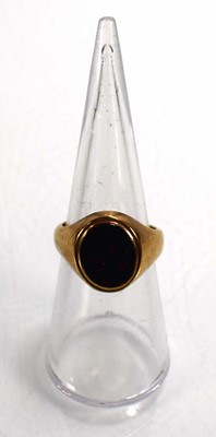 Lot 718 - A 9ct yellow gold signet ring set bloodstone,...