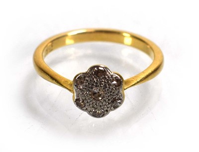 Lot 721 - An 18ct yellow gold cluster ring set small...