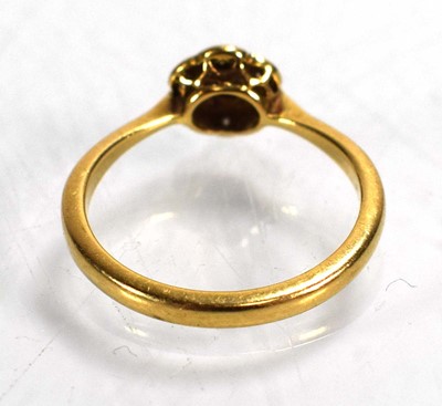 Lot 721 - An 18ct yellow gold cluster ring set small...