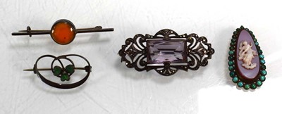 Lot 725 - A gilt metal plaque of oval form centrally...