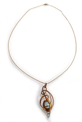 Lot 729 - A yellow metal necklace suspending a 9ct rose...