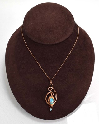 Lot 729 - A yellow metal necklace suspending a 9ct rose...