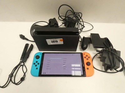 Lot 2013 - Nintendo Switch OLED 64GB with charging dock...