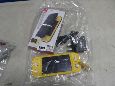 Lot 2581 - Nintendo Switch Lite in yellow with Switch...