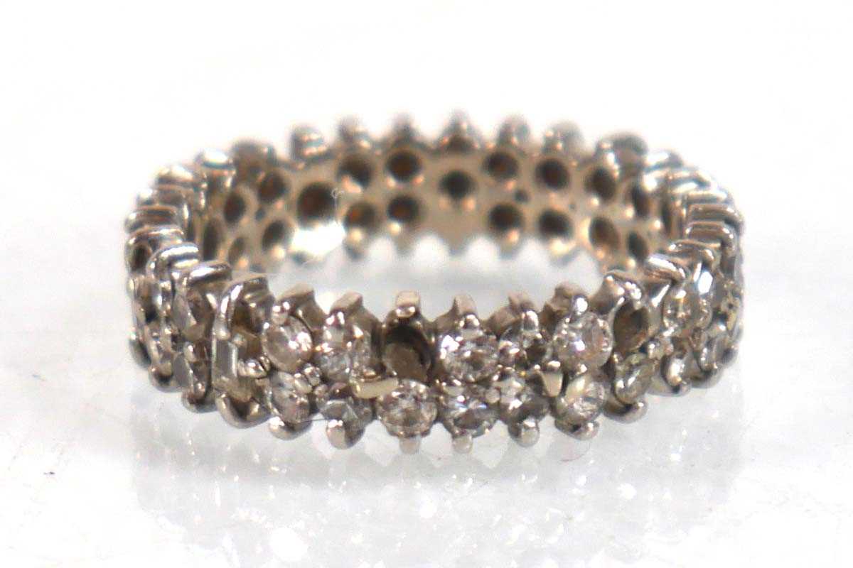 Lot 754 - A white metal full eternity ring set two rows...