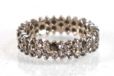 Lot 754 - A white metal full eternity ring set two rows...