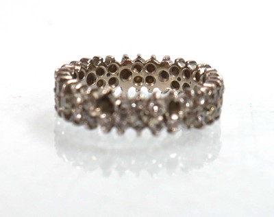 Lot 754 - A white metal full eternity ring set two rows...