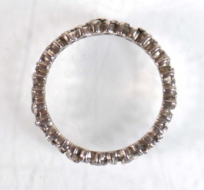 Lot 754 - A white metal full eternity ring set two rows...