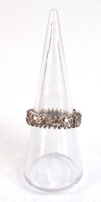 Lot 754 - A white metal full eternity ring set two rows...