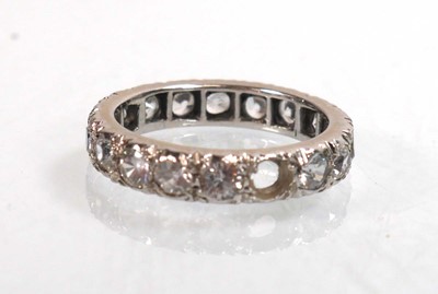 Lot 755 - A white metal full eternity ring set white...