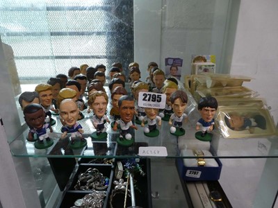 Lot 2795 - Shelf of collectible figures of football...