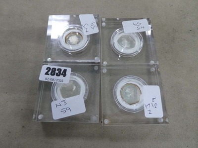 Lot 2834 - 4 plastic mounted collectible Paddington Bear...